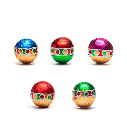 Five colorful chocolate eggs with foil wrapping on a white background